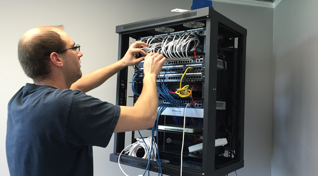 This is a picture showing a Network Rack being installed